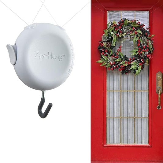 ZipnHang Invisible Wreath Hanger with wreath displayed on red front door